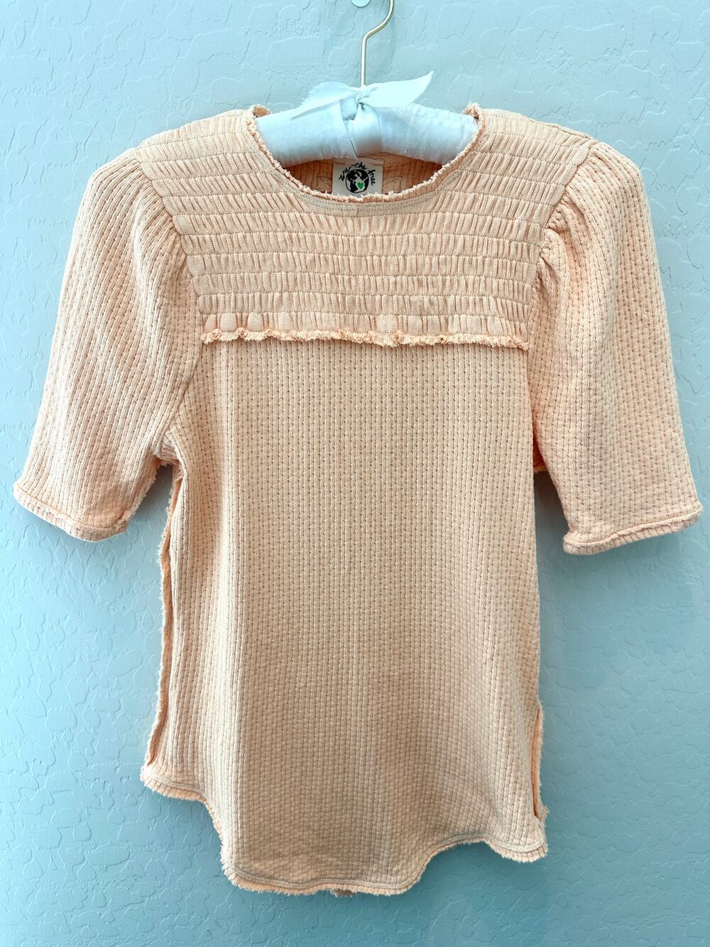 FREE PEOPLE We The Free Peach Smocked Top Short Sleeve Knit Boho Tee NWT | Small